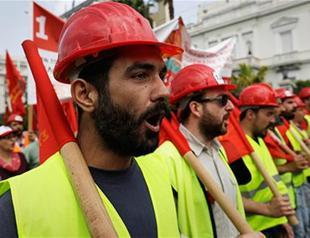 Greeks mark May Day with strike, demos against fresh cuts