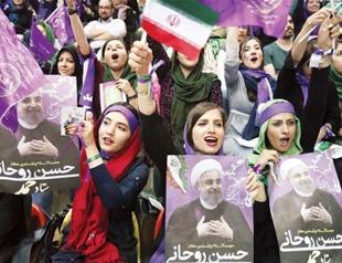 Iran votes in head-to-head between diplomacy and resistance