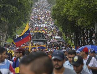Thousands march against Maduro in Venezuela on day 50 of anger