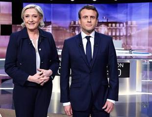 A woman will rule France; Either me or Merkel