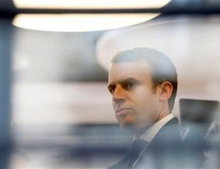 French authorities take hardline over Macron hack attack