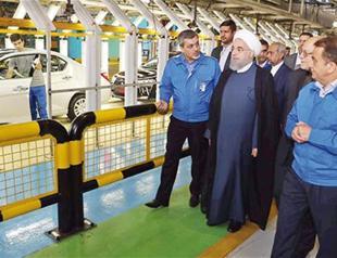 Absent from US, French cars drive into Iran polls