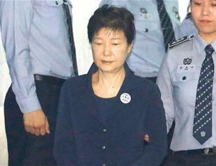 South Korea’s Park denies charges as corruption trial begins