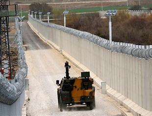 Turkey’s wall on Syria border sharply reduces illegal crossings