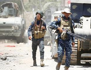 Looters target empty homes in Iraq’s Mosul