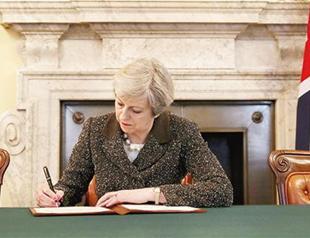 UK Prime Minister May triggers ‘historic’ Brexit with letter to EU