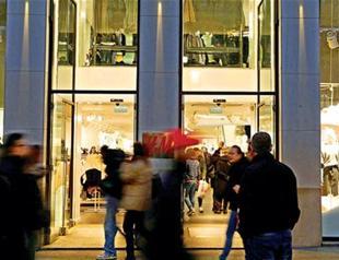 H&M launches new upmarket brand as profits slow