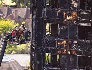 PM May faces mounting criticism over London fire