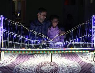 Father in Turkey’s remote southeast makes model Bosphorus Bridge for curious daughter
