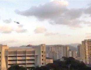 Helicopter attacks Venezuela court, Maduro denounces coup bid