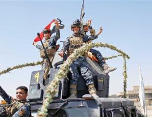 Iraqi military says it has retaken two Mosul neighborhoods from ISIL
