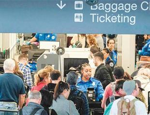 US unveils enhanced airline security plan to avoid laptop ban