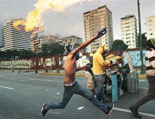 Granted house arrest, Venezuela opposition leader vows to fight on