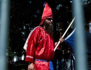 KKK marchers in Virginia town met by throngs of counter-protesters
