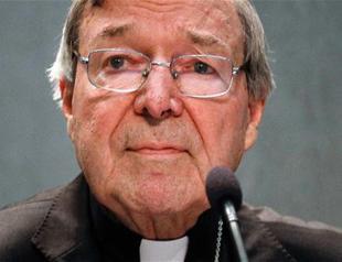 Cardinal Pell back in Australia to face abuse charges