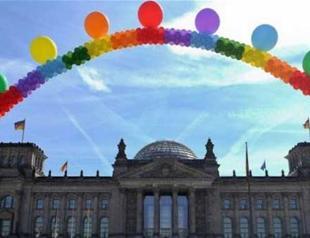 Germany legalizes same-sex marriage, Merkel votes against