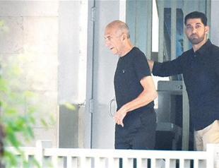 Former Israeli PM Olmert freed from jail on parole