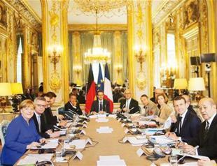 Merkel, Macron lead joint cabinet meeting with EU unity in mind