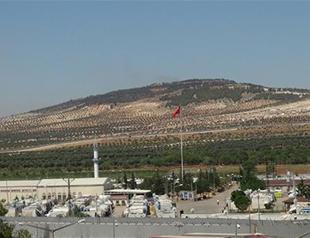 Turkish artillery shells PYD positions in northern Syria after harassment fire