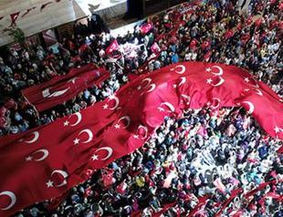 Turks flock to streets to mark foiled coup anniversary