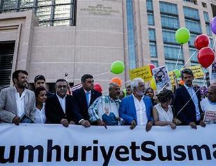 Turkish daily Cumhuriyet journalists, executives go on trial in Istanbul