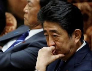 Japan PM Abe denies favors for friend amid falling support