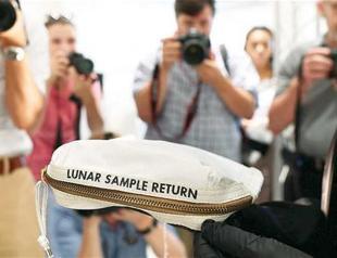 Neil Armstrong’s moon bag sells for $1.8 million at auction