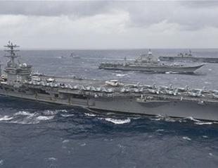 US House boosts military spending, gives Trump border wall money