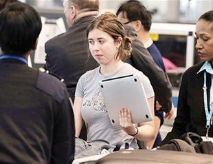 Laptop ban, protectionism hang over booming air travel industry