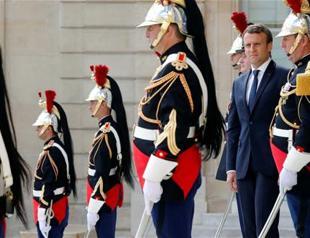 Macron headed for huge majority, but low turnout a concern