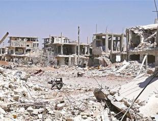 Australia suspends air operations over Syria