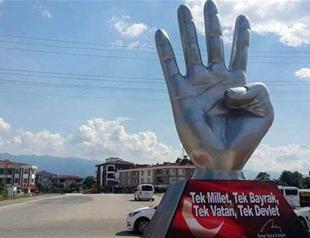 Turkish municipality erects Rabia sign statue