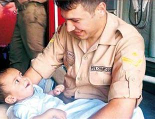 Heartwarming story behind photo of Syrian migrant baby rescued by Turkish coast guards