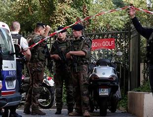 Suspect arrested after car rams troops in Paris suburb