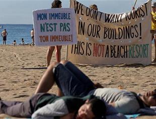 Fed up with mass tourism, Europe’s hotspots take away the welcome mat