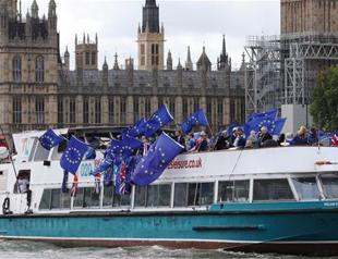 Britain calls on EU to move Brexit talks forward