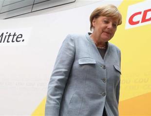 Chastened Merkel braces for coalition tussle after vote