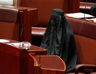 Australian far-right senator Hanson wears burka in bid to ban them