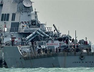 10 sailors missing in collision between US warship, tanker