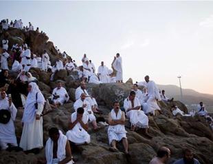 Muslim pilgrims scale Mount Arafat for peak of hajj