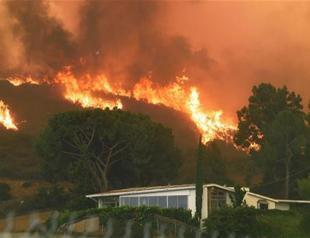 Los Angeles turns corner on largest wildfire in city history