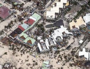 Irma kills at least 9, 2 storms upgraded to hurricane status