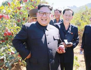 N Korea slams Trump as South approves aid