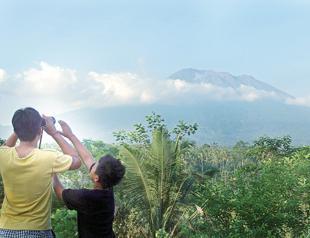 Indonesia ready to divert tourists as volcano rumbles