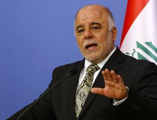 Iraqi parliament asks leader Abadi to take back Kurd-held Kirkuk