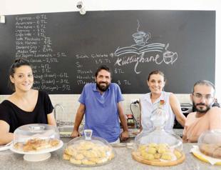 Turkish academics dismissed with emergency decrees open café-library in Mersin