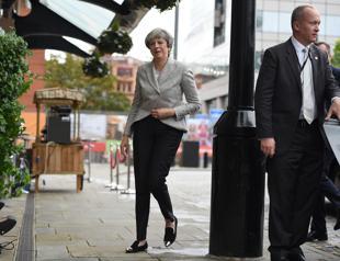 Taking on critics, Britain’s May vows to deliver Brexit