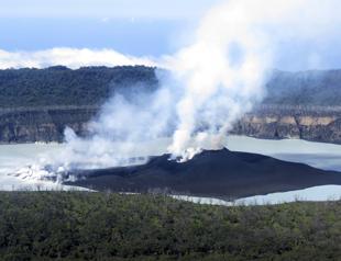 Vanuatu steps up evacuation as volcano spews ash