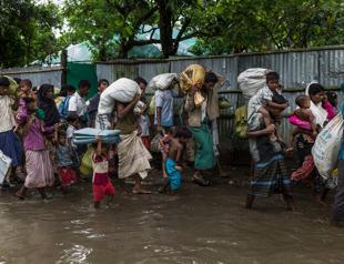 Bangladesh scuttles boats, jails captains to curb Rohingya influx