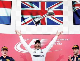 Ruthless Hamilton roars to Japanese Grand Prix victory